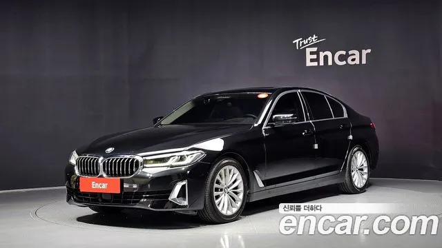 BMW 5-Series 2021 — photo 1
