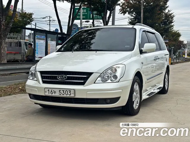 Kia Canival 2010 — photo 1