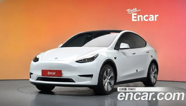 Tesla Model Y 2024 — photo 1