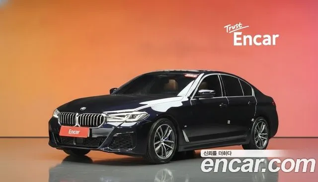 BMW 5-Series 2022 — photo 1