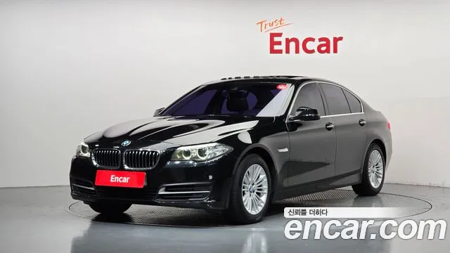 BMW 5-Series 2015 — photo 1