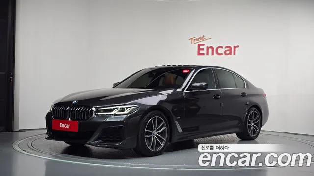 BMW 5-Series 2021 — photo 1
