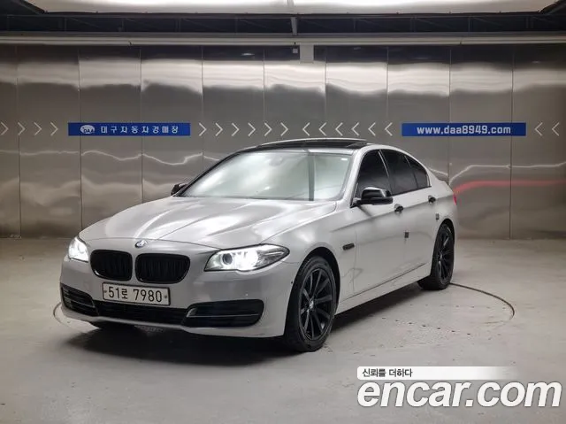 BMW 5-Series 2014 — photo 1