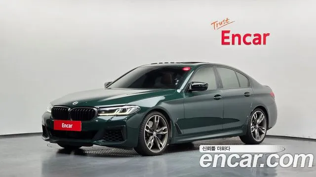 BMW 5-Series 2021 — photo 1