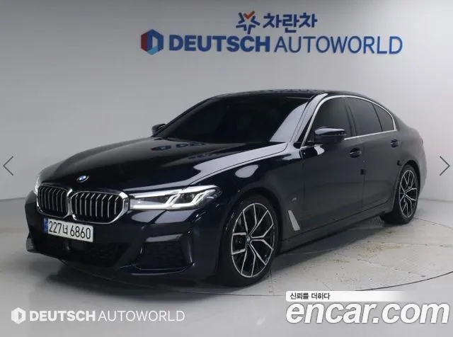 BMW 5-Series 2022 — photo 1