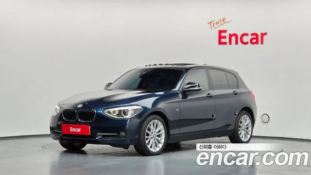 BMW 1-Series 2015 — photo 1