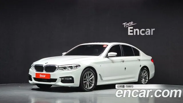 BMW 5-Series 2018 — photo 1