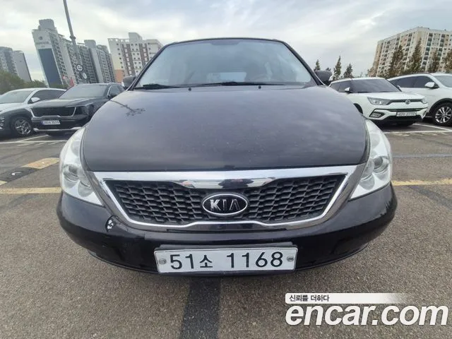Kia Canival 2012 — photo 1