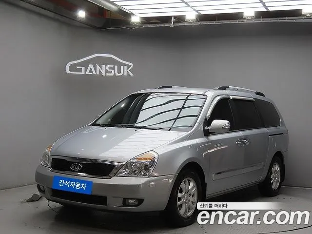 Kia Canival 2011 — photo 1