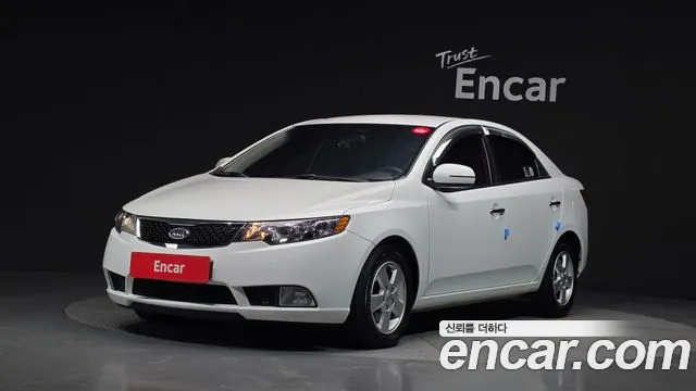 Kia Porte 2011 — photo 1