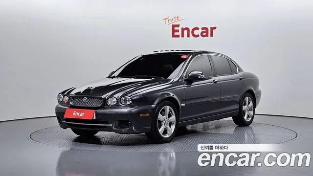 Jaguar X-TYPE 2009 — photo 1