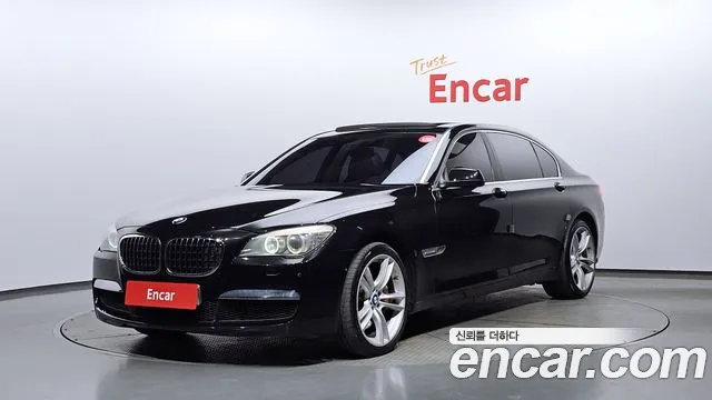 BMW 7-Series 2011 — photo 1