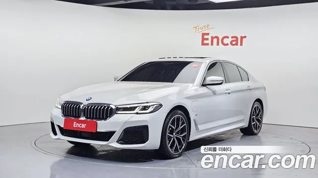 BMW 5-Series 2021 — photo 1