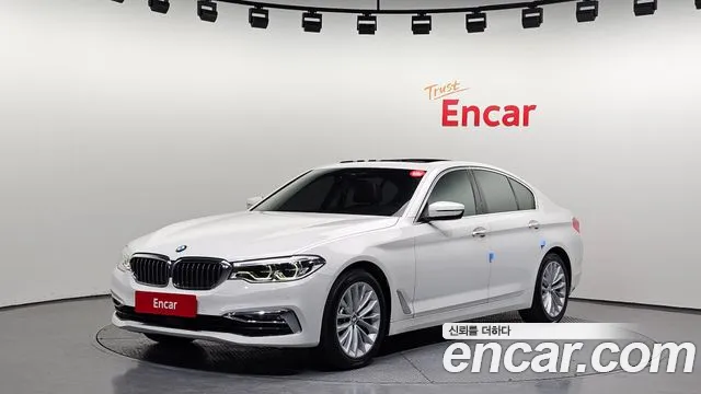 BMW 5-Series 2018 — photo 1