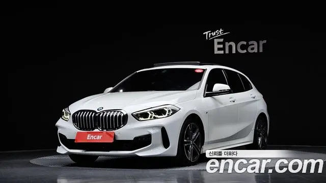 BMW 1-Series 2024 — photo 1