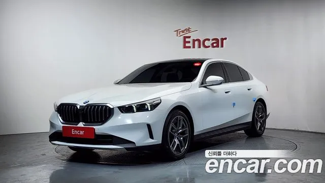 BMW 5-Series 2024 — photo 1