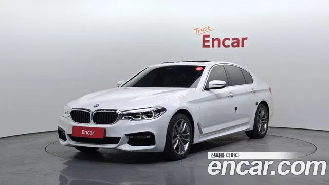 BMW 5-Series 2018 — photo 1