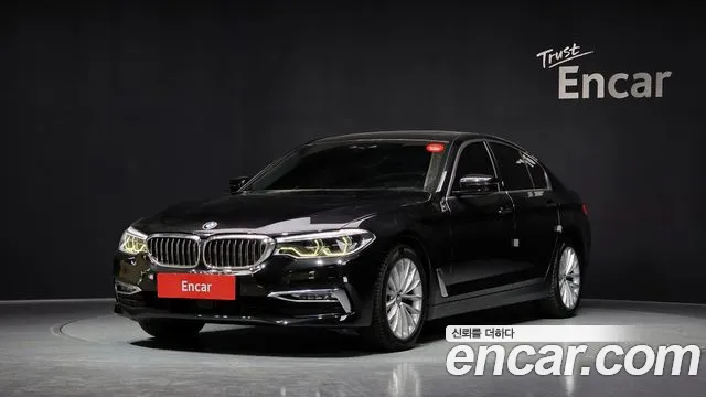 BMW 5-Series 2018 — photo 1