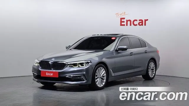 BMW 5-Series 2019 — photo 1