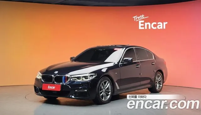 BMW 5-Series 2018 — photo 1