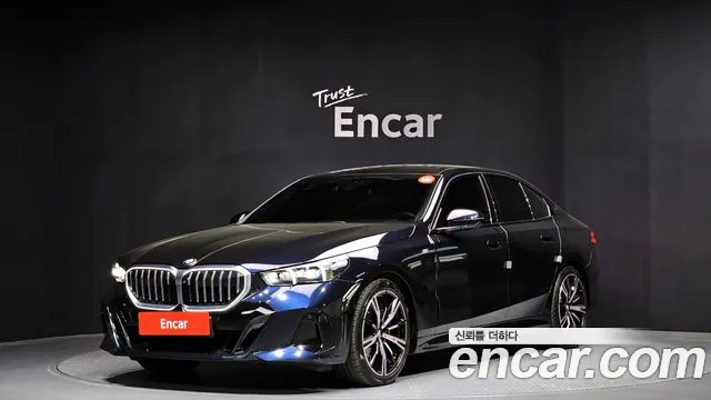 BMW 5-Series 2024 — photo 1