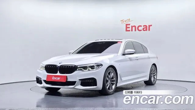 BMW 5-Series 2019 — photo 1