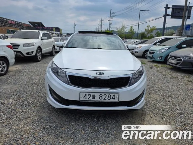 Kia K5 2011 — photo 1
