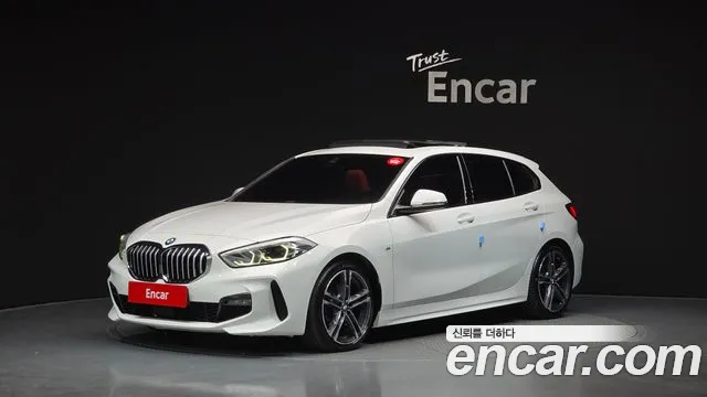 BMW 1-Series 2021 — photo 1