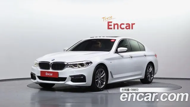 BMW 5-Series 2018 — photo 1