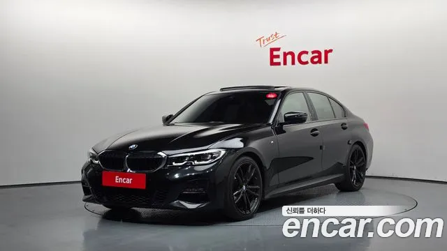 BMW 3-Series 2021 — photo 1