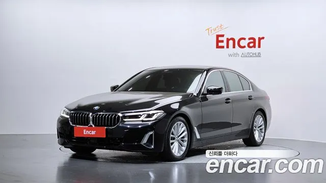 BMW 5-Series 2023 — photo 1
