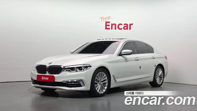 BMW 5-Series 2018 — photo 1