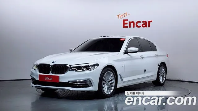 BMW 5-Series 2018 — photo 1