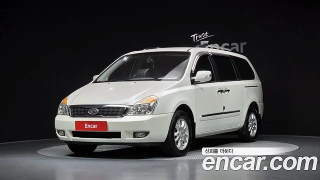 Kia Canival 2010 — photo 1