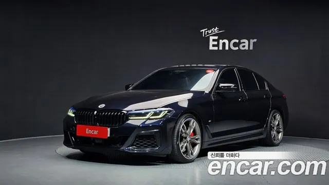 BMW 5-Series 2023 — photo 1