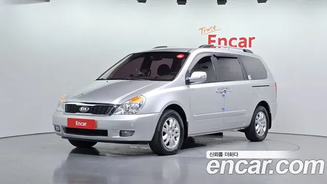 Kia Canival 2013 — photo 1