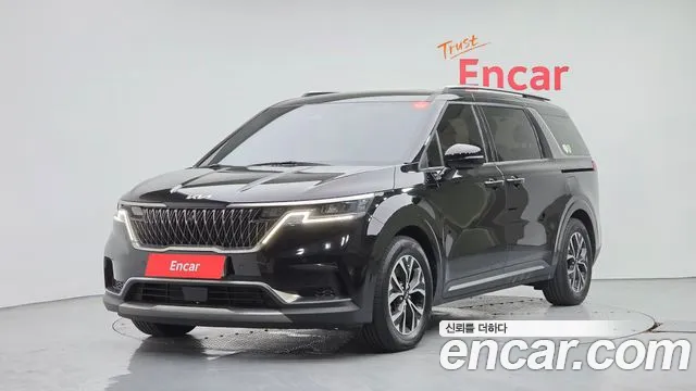 Kia Canival 2023 — photo 1