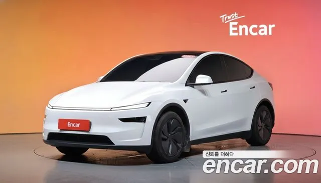 Tesla Model Y 2025 — photo 1