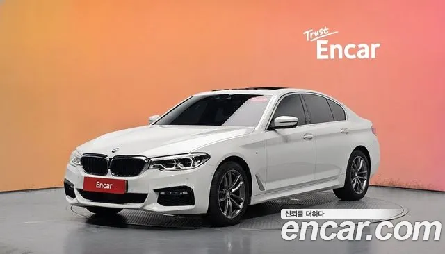BMW 5-Series 2018 — photo 1