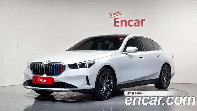 BMW 5-Series 2024 — photo 1