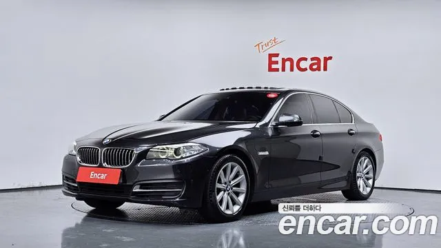 BMW 5-Series 2014 — photo 1