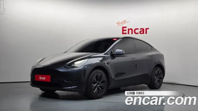 Tesla Model Y 2024 — photo 1
