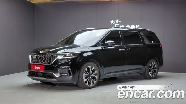 Kia Canival 2023 — photo 1