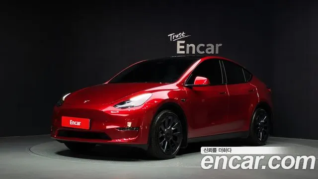Tesla Model Y 2024 — photo 1