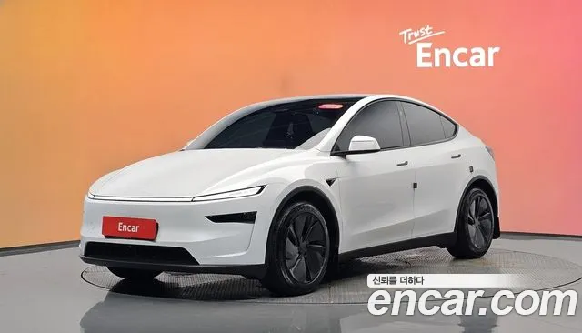 Tesla Model Y 2025 — photo 1