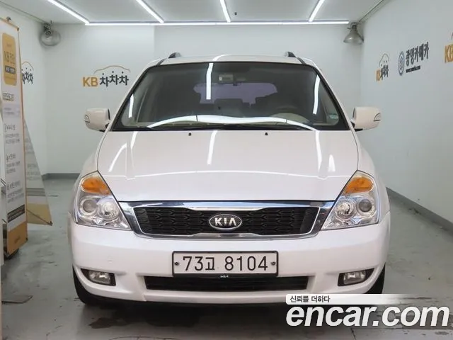 Kia Canival 2012 — photo 1