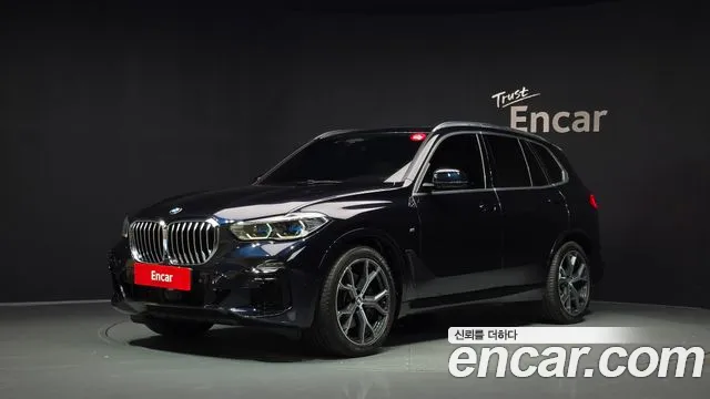 BMW X5 2021 — photo 1