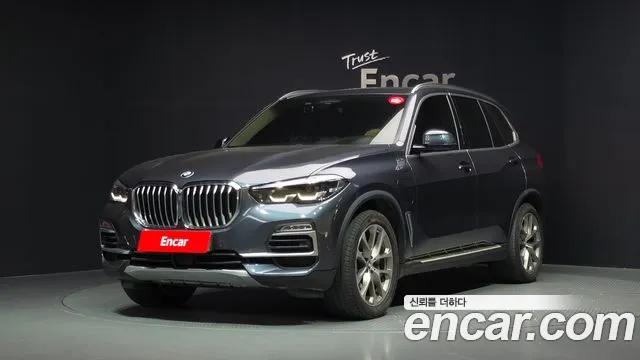 BMW X5 2021 — photo 1