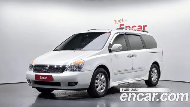 Kia Canival 2011 — photo 1