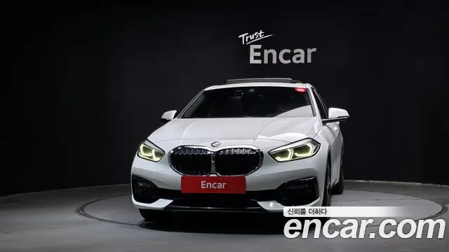 BMW 1-Series 2021 — photo 1
